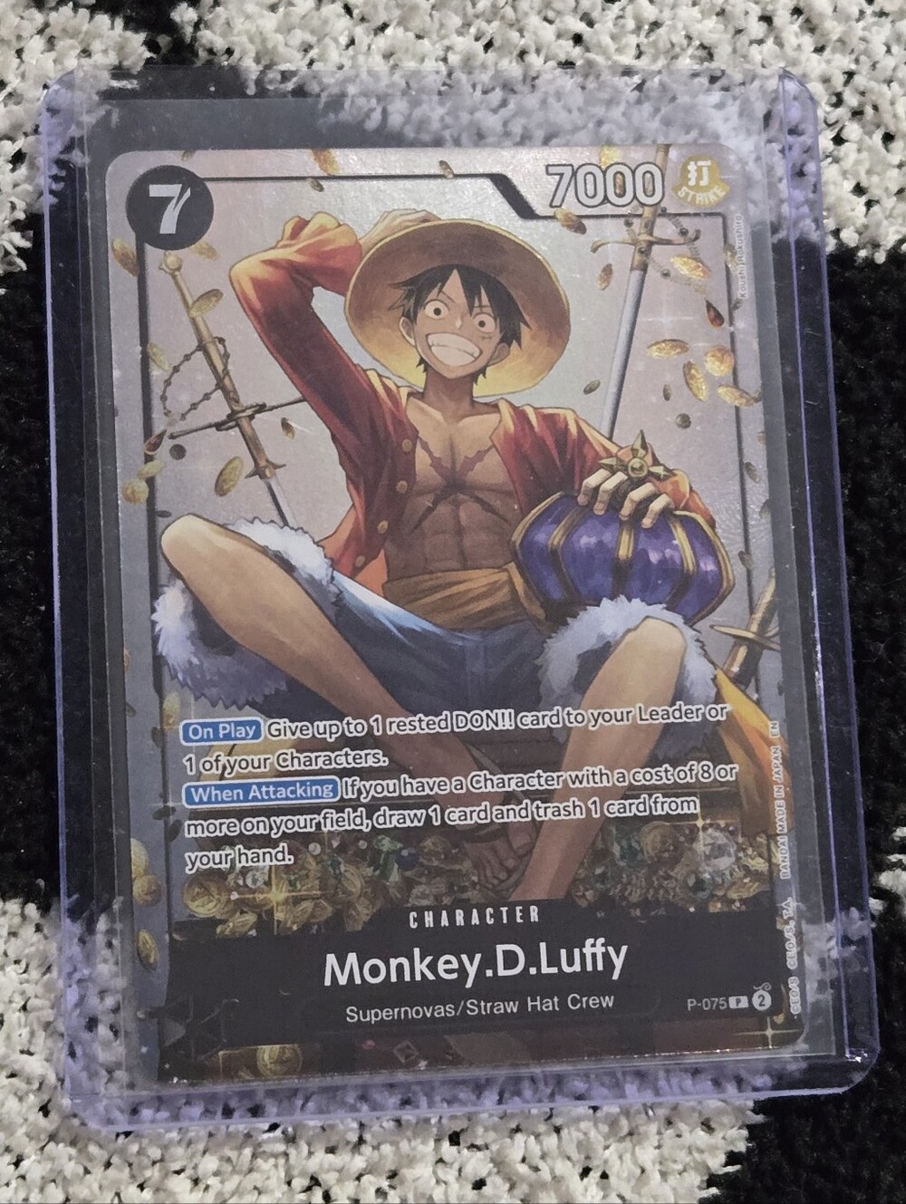 Monkey. D. Luffy (P-075) promo card from the One Piece Card Game Tin Pack Set